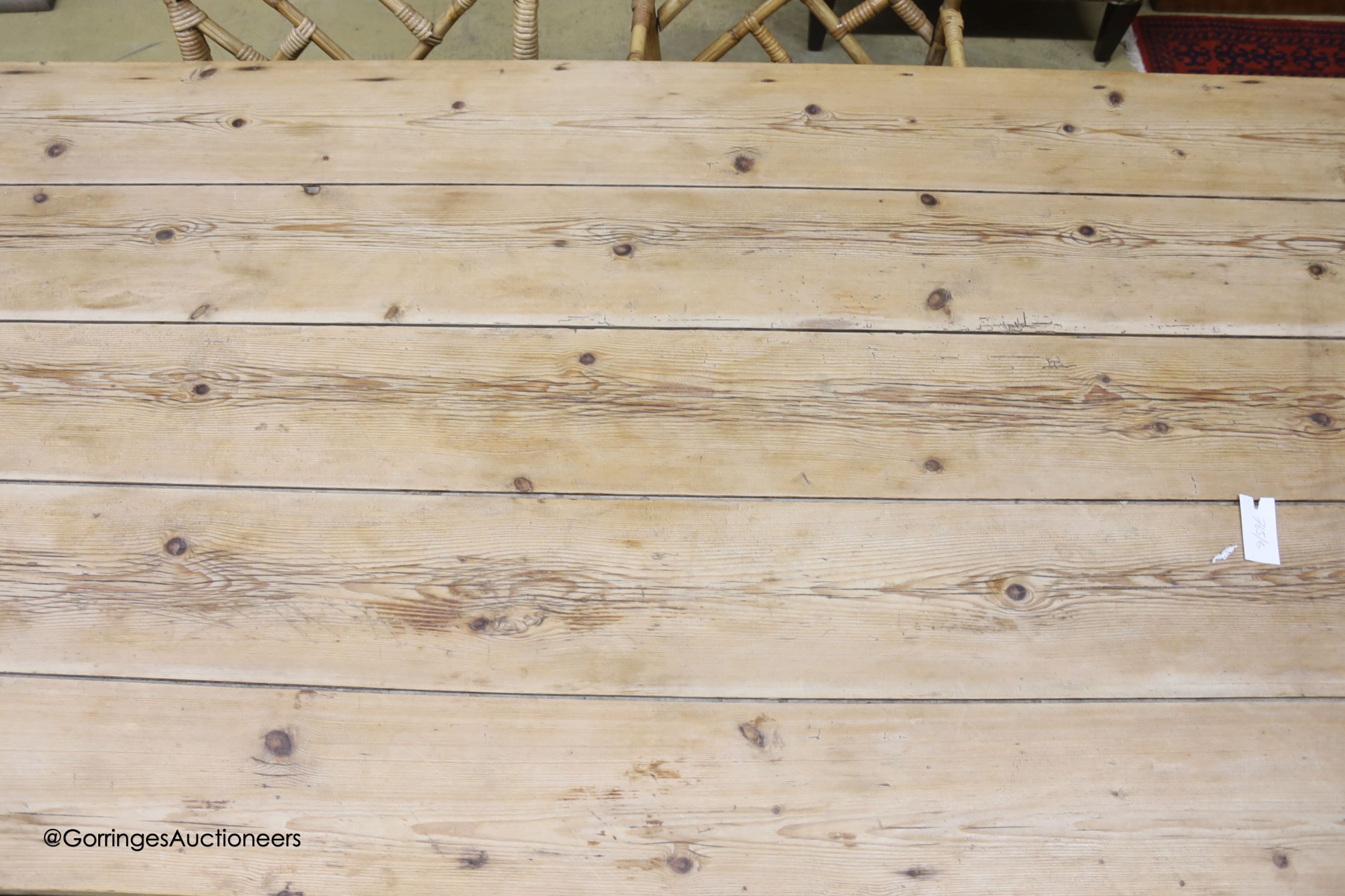 A 19th century rectangular pine plank top farmhouse kitchen table, length 211cm, depth 98cm, height 75cm